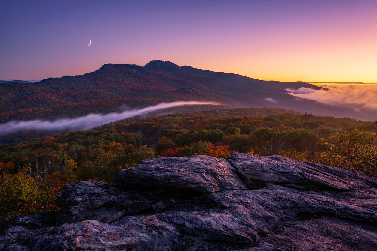 The autumn landscape glowing in the light of the morning sky at Grandfather Mountain in North Carolina's Blue Ridge Mountains